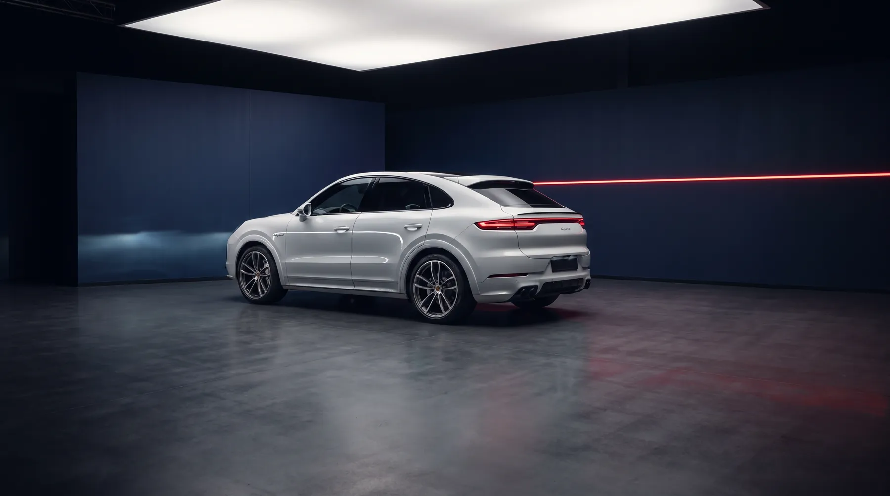 2025 Porsche Cayenne Turbo E-Hybrid Coupe, rear three-quarter view